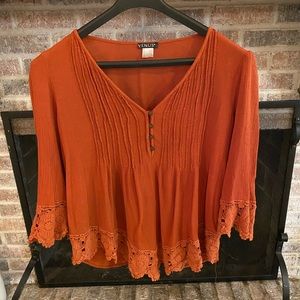 Rust colored flattering Boho style shirt.